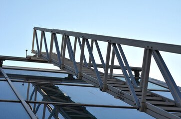 aluminum footbridge for washing windows above the skylight. simplifying the washing of large...