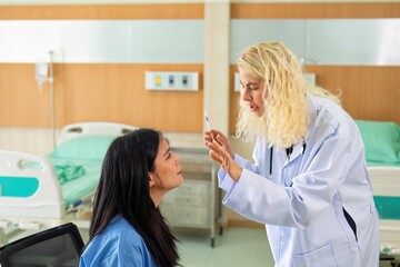 Young woman consult with doctor for botulinum toxin botox face injection at beauty treatment clinic