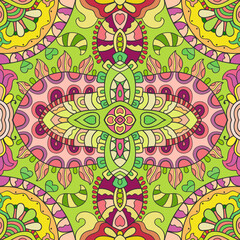 Hand drawn seamless graphic pattern, colorful artistic background with floral and geometric elements. Doodle ethnic mandala ornament for textile fabric, paper print. Surface texture 