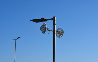 toll gate with antennas with perforated satellites transmitter and receiver. reads data from toll boxes in trucks and lorries . pays for using the highway, road and exceeding the speed limit. radar