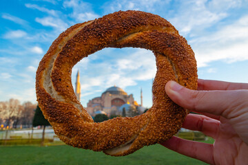 Simit or Turkish Bagel with Hagia Sophia. Travel to Istanbul concept photo