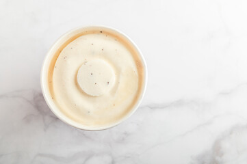 Obraz na płótnie Canvas Chocolate Chip Cookie Dough Ice Cream in Paper Cup, High in Protein