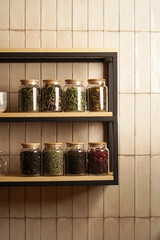 Modern kitchen shelf with white tiles wall