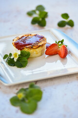 Soufflee with strawberries on the plate