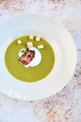 Green peas Asparagus soup on the plate