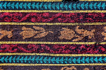 Various types of fabrics and textile products used as a base and background.