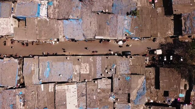 Dharavi Slum in Mumbai, India. Top Down Aerial View of Street and Rooftop of Buildings in Poor Residential Neighborhood