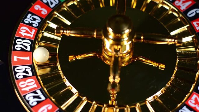 The roulette wheel in the casino is spinning - 7 red wins