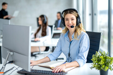 Portrait of female operator ready for online assistance at call center. - obrazy, fototapety, plakaty
