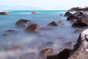 Rock Bay.  Rock formations at Shek Pai Wan, Lamma, Hong Kong.  Long exposure gives a misty smooth sea.