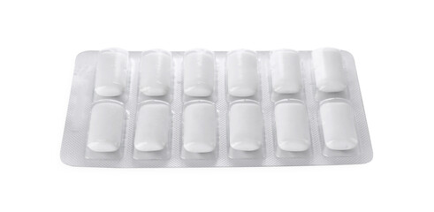 Blister with chewing gums on white background