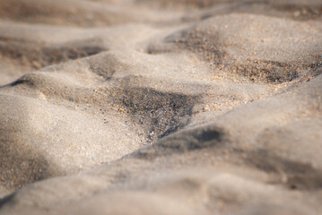 Fototapeta na wymiar Photographie abstraite de sable sur la plage.