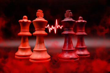 face to face between king and black queen against king and white queen of chess, red crimson led...