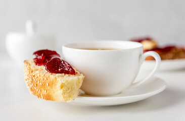 piece of roll with fruit jam