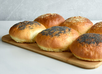 baked buns with se with sesame and poppy