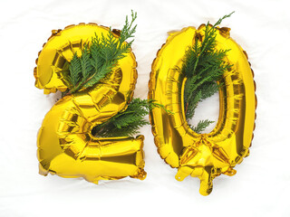 20 golden foil balloon number party bunting on white cloth - 578651523