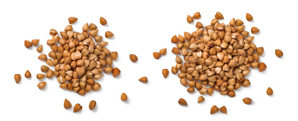 Two piles of buckwheat groats isolated on white background. Cereal set