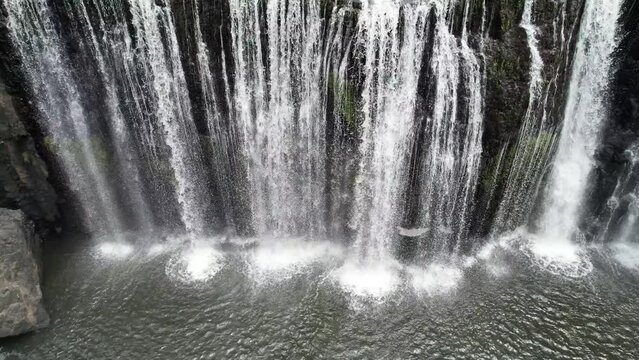 Spectacular aerial footage of Millstream Falls Atherton Tablelands Queensland Australia
