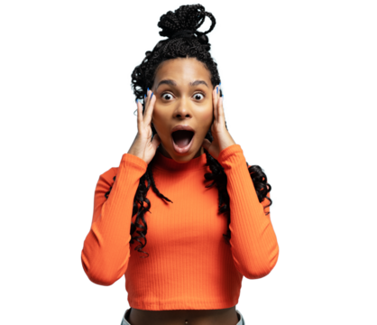 young pretty woman feeling shocked, excited and happy, laughing and celebrating success on transparent wall