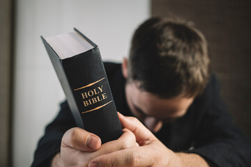 Holy Bible in men's hands. The concept of faith and religion. christian faith.