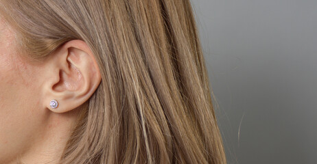 close-up of woman hair and ear