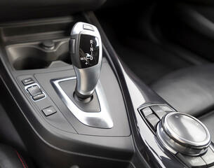 Car gear shifter detail close up. 