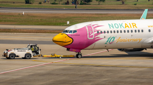 Nok Air jetliner being pushed back for take-off at Don Mueang International Airport in Bangkok