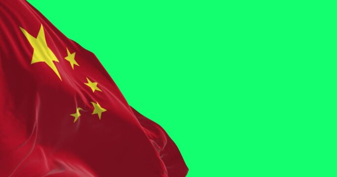 Seamless loop in slow motion of China flag waving on a green background