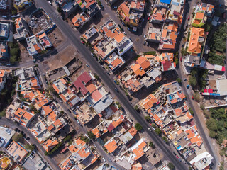 Naklejka premium Aerial photos of Praia, the capital city of Santiago Island, Cabo Verde, reveal a bustling metropolis with a vibrant culture, stunning architecture, and breathtaking views of the Atlantic Ocean.