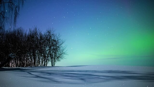 Time lapse of moving stars at colorful lighting sky during Aurora Borealis - Yellow,green,pink,purple colored sky at night during winter season