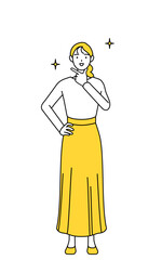 自信家のポーズを取るカジュアルな格好をした若い女性