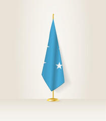 Micronesia flag on a flag stand.