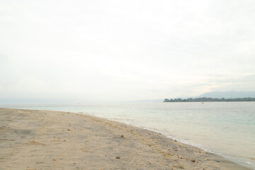 Lombok and Gili Air islands, overcast, cloudy day, sky and sea. Sunny day, sand beach.