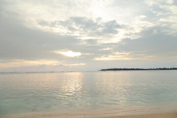 Fototapeta na wymiar Lombok and Gili Air islands, overcast, cloudy day, sky and sea. Sunset, sand beach.