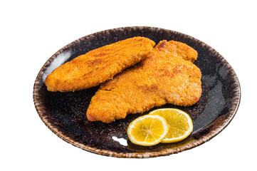 Roasted breaded german weiner schnitzel on a plate.  Isolated, transparent background - obrazy, fototapety, plakaty