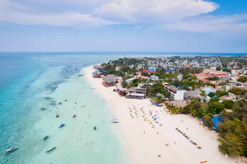 Crédence de cuisine en verre imprimé Plage de Nungwi, Tanzanie The picturesque Nungwi beach in Zanzibar, Tanzania is showcased in a toned aerial view image, highlighting the luxury resort and turquoise ocean waters.