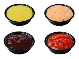 different types of sauces in small bowls isolated