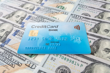 Credit card on US dollar banknotes. Finance development, Banking Account, Statistics, Investment Analytic research data economy, Stock exchange trading, Business company concept.