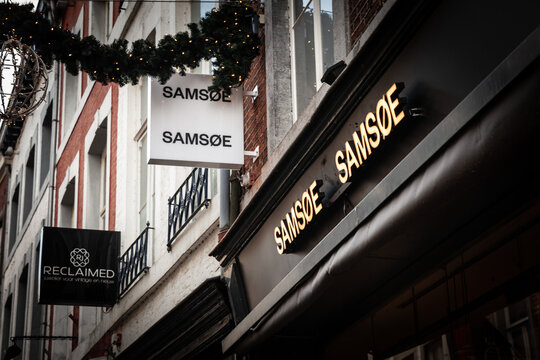 MAASTRICHT, NETHERLANDS - NOVEMBER 10, 2022: Logo of Samsoe Samsoe on their main store in Maastricht. Samsoe Samsoe is a Danish fashion retailer specialized in Scandinavian clothing, menswear and wome