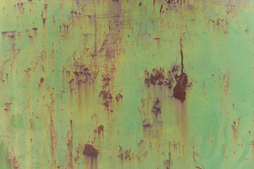 Texture of a rusty green-red background. A grungy, vintage background with copy space.