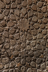 ancient stone wall with islamic pattern