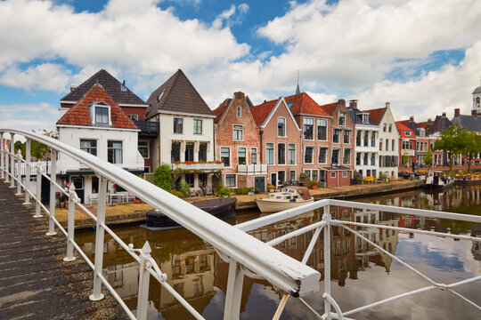Ancient canal houses and bridge in the city center of Dokkum in Friesland, The Netherlands