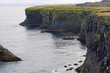 Rocky cliffs in Arnastrapi village at Snaefellsnes Peninsula, Iceland