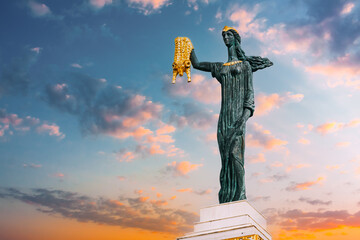 Batumi, Adjara, Georgia. Statue Of Medea On sunset sunrise Sky Background In Europe Square. Woman...