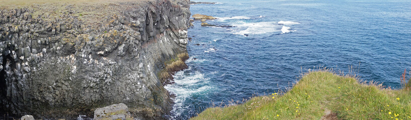 Rocky cliffs in Arnastrapi village at Snaefellsnes Peninsula, Iceland