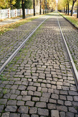 Streetcar rails leading into the far