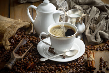 Espresso coffee with coffee beans on old background.