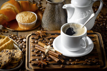 Fototapeta premium Espresso coffee with coffee beans on old background.