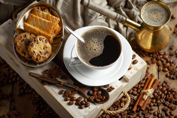 Espresso coffee with coffee beans on old background.