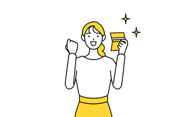 預金通帳を見て喜ぶカジュアルな格好をした若い女性